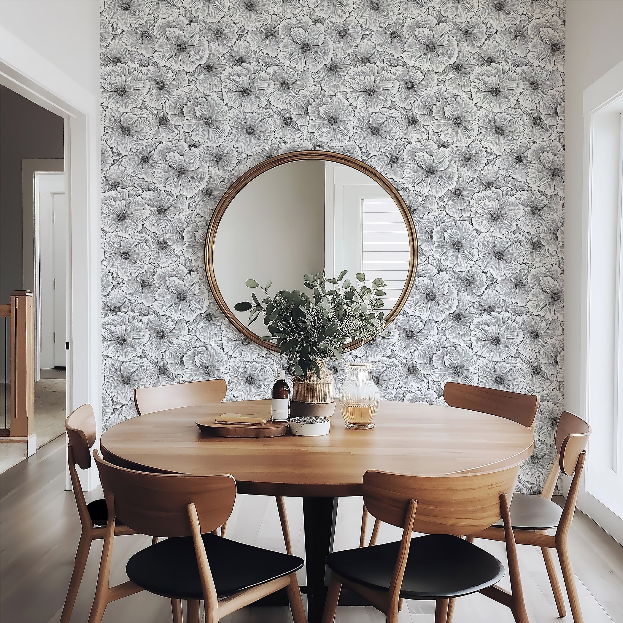 Elegant monochrome floral wallpaper featuring hand-sketched flowers in black and white, enhancing modern dining space decor.