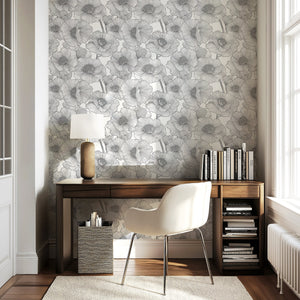 Elegant monochrome flower wallpaper in a modern office setting, featuring black and white floral designs.