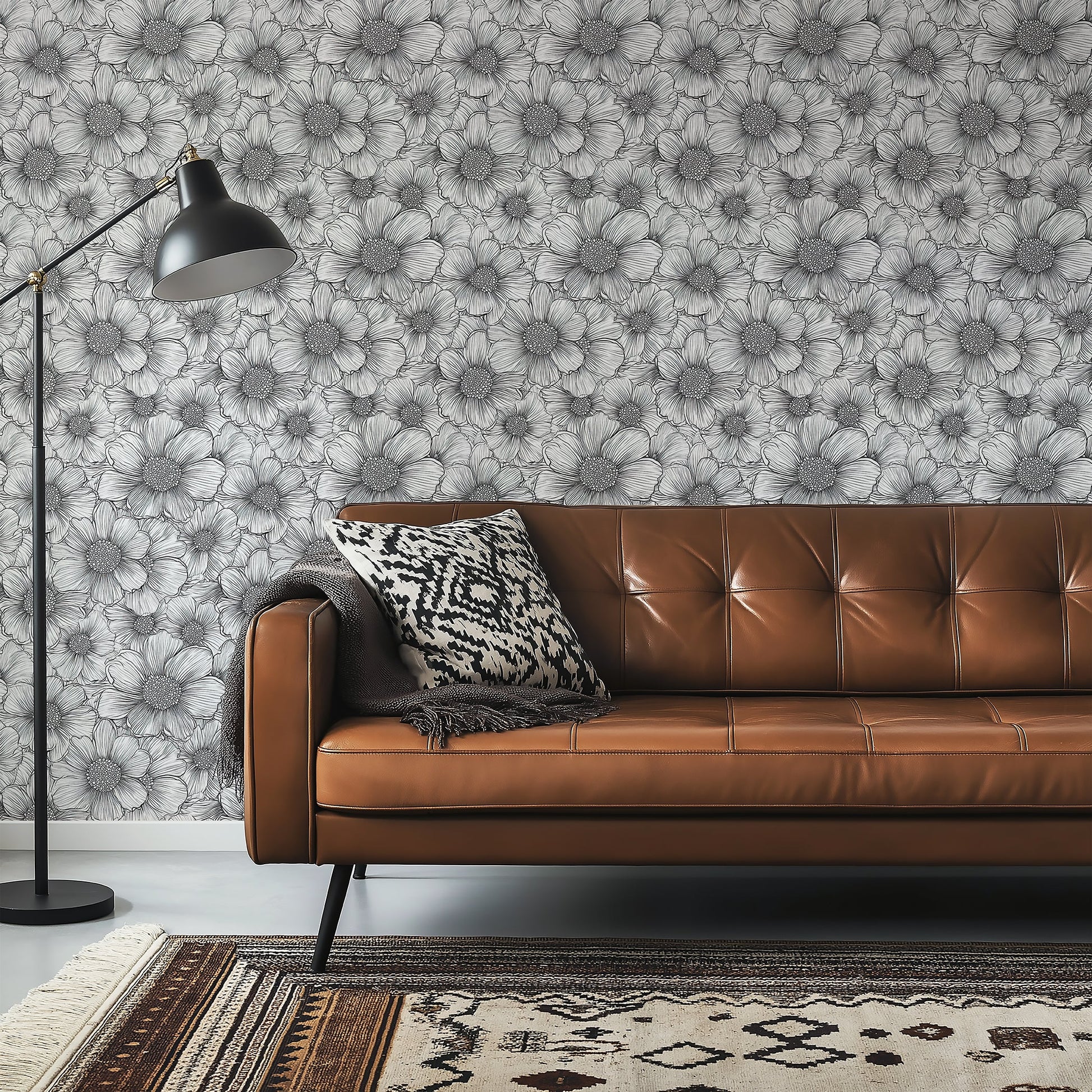 Sophisticated black and white floral wallpaper design featuring hand-drawn flowers, enhancing a modern living space.