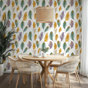 Feather Fantasy wallpaper featuring vibrant peacock feathers in mustard, emerald, and violet, enhancing a stylish dining area.