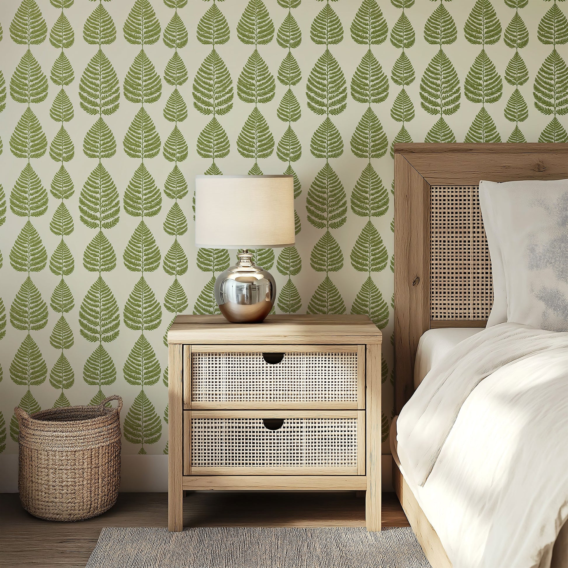 Fernwood Forest wallpaper featuring green ferns and leaves on creamy background in a serene bedroom setting.