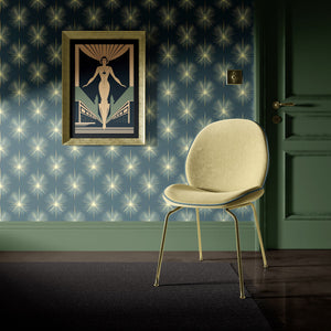 Elegant room featuring Champagne Starburst wallpaper with art deco design, showcasing mid-century modern style and sophistication.