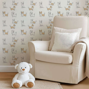 Beige armchair with "Puppy Parade" wallpaper featuring illustrated puppies in a nursery setting with a stuffed bear.