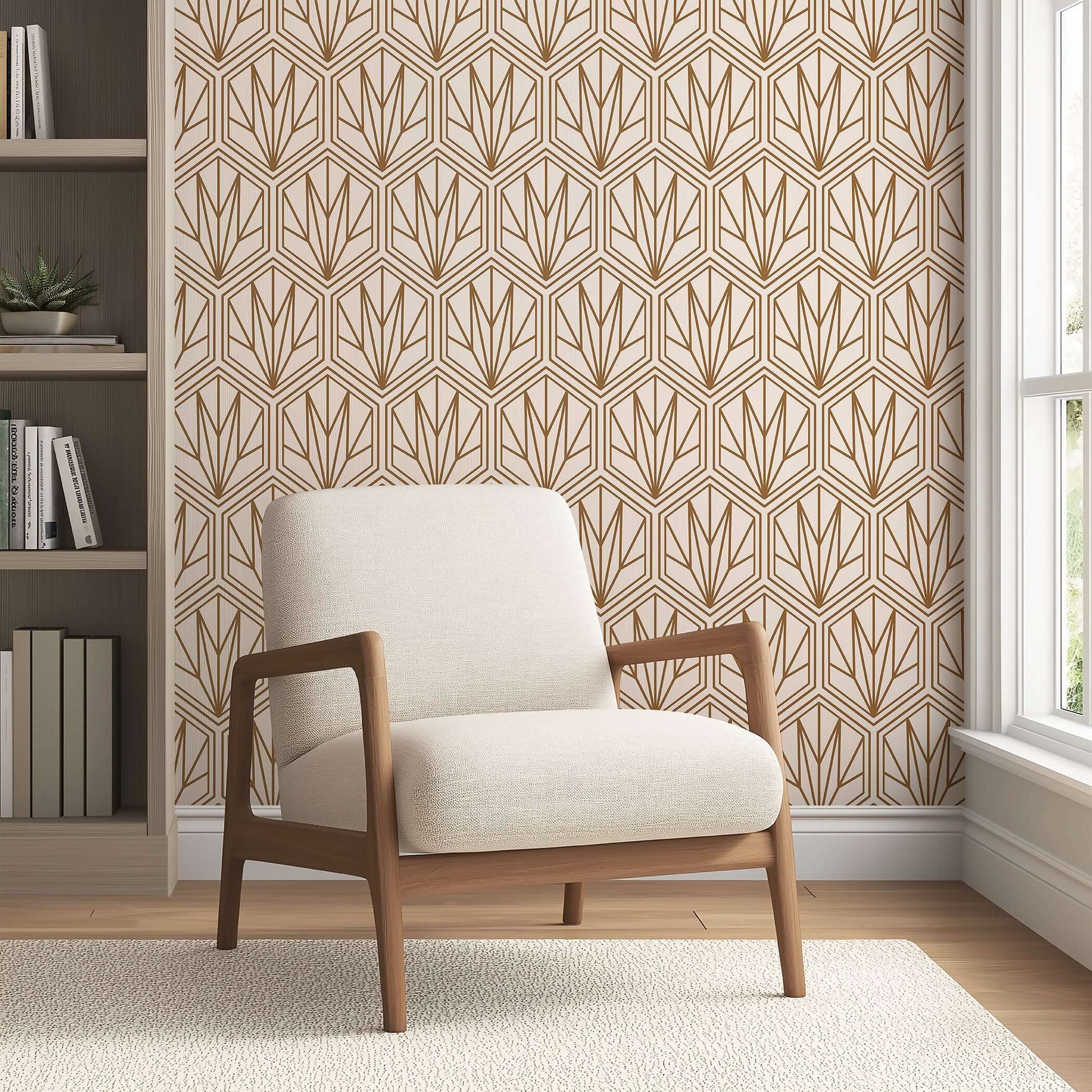 Art Deco geometric wallpaper with bronze hexagonal pattern and cream background in a cozy room with a modern chair.