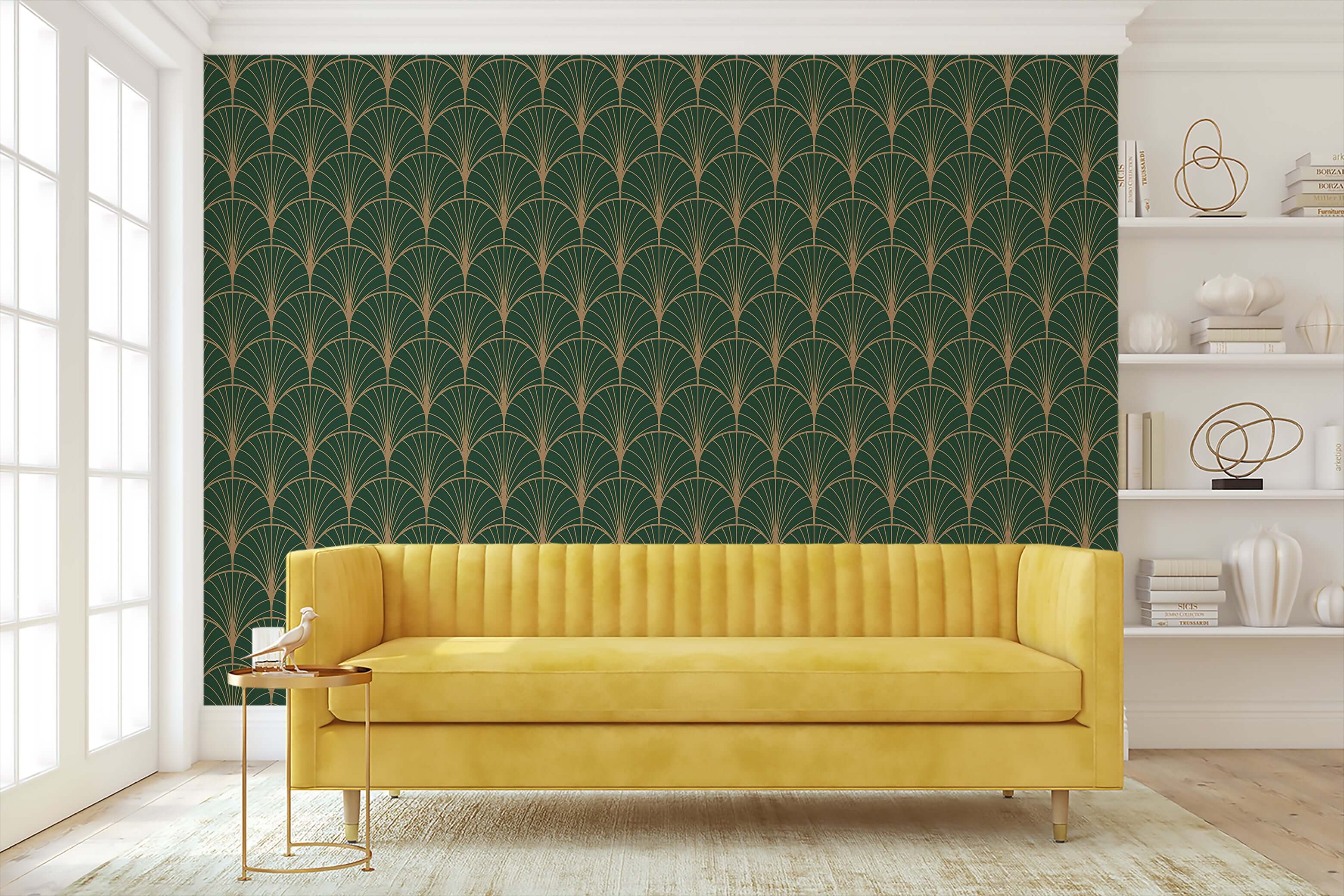 Art Deco geometric wallpaper with metallic gold fan motif on emerald green background, featuring a yellow couch in elegant setting.