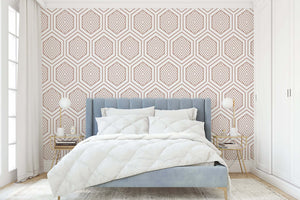 Elegant bedroom with rose gold geometric prism wallpaper, featuring art deco style and modern luxury design elements.