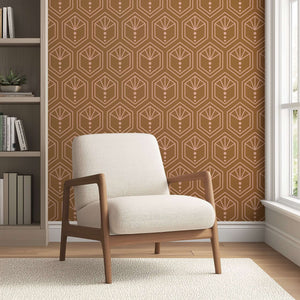 Modern art deco geometric wallpaper in copper tones with honeycomb crest pattern, enhancing a stylish living room setting.