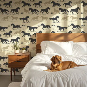 Prairie Run horse wallpaper in black, brown, and tan hues, creating a western-themed bedroom ambiance with a dog on the bed.