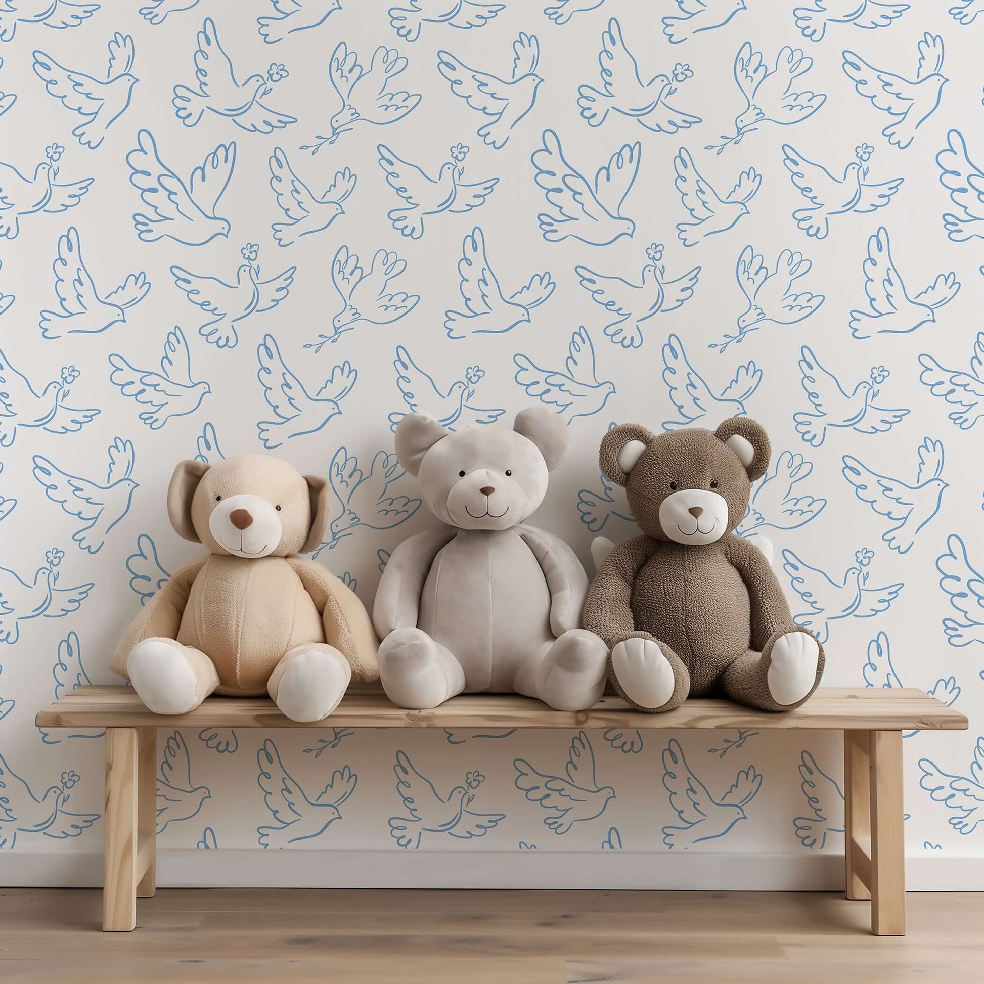 Teddy bears on bench with blue dove wallpaper, perfect for children's nursery or playroom, featuring modern design in blue and white.