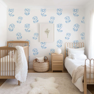 Sweetheart Blooms wallpaper with blue heart-shaped flowers on white backdrop, perfect for modern children's nursery or playroom decor.