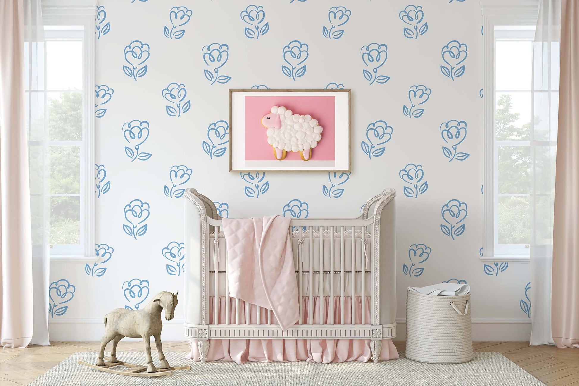 Children's nursery with Sweetheart Blooms blue floral wallpaper, featuring modern heart-shaped flowers and an elegant white crib.