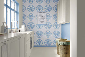 Elegant French country style room with Chateau Garden floral blue wallpaper, perfect for children's nursery or playroom.
