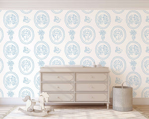 Charming blue and white French-inspired wallpaper with curly-haired portraits, birds, florals, and vases in a modern setting.