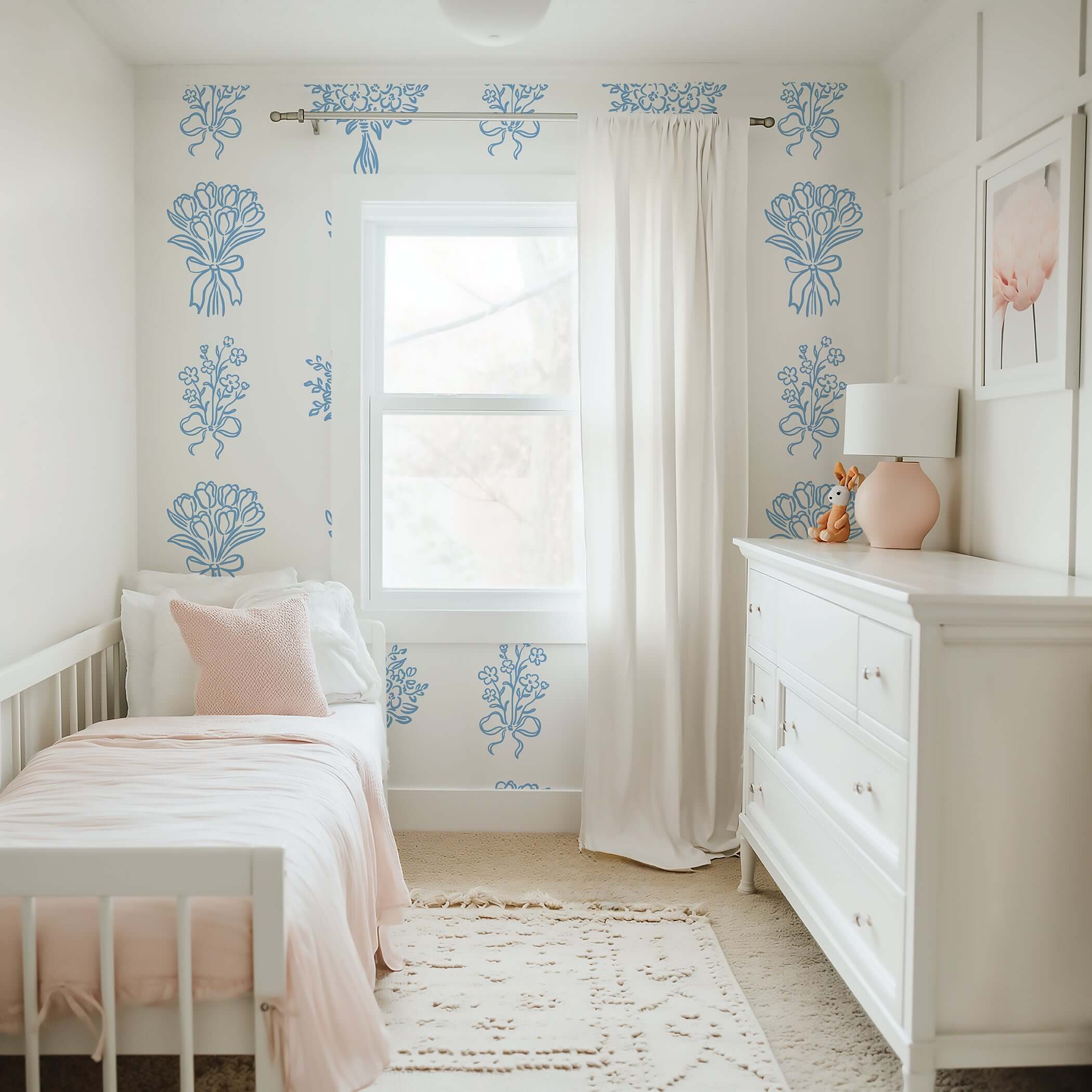Elegant nursery with Blue Ink Botanicals wallpaper featuring soft blue floral patterns on white, perfect for cottage design or timeless style.