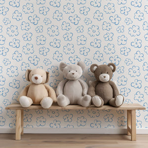 Playful abstract blue and white floral wallpaper with teddy bears on a bench, ideal for modern kids' rooms.