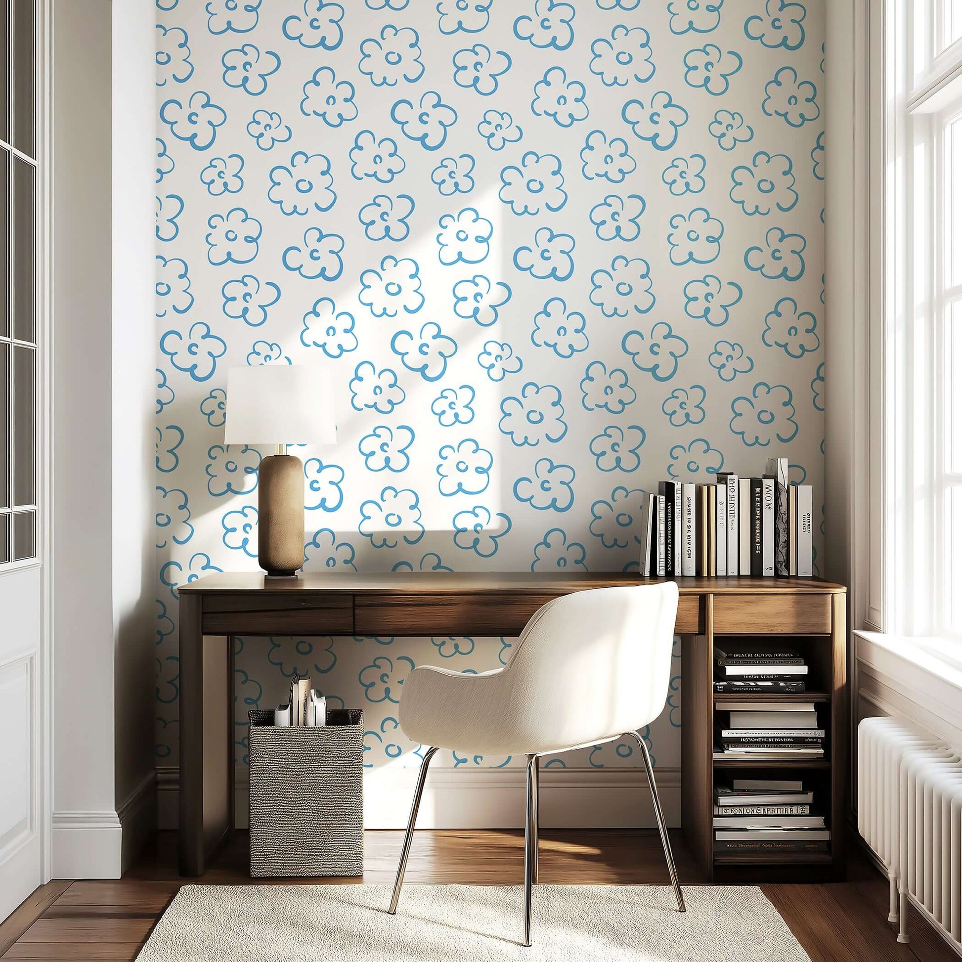 Abstract blue and white floral wallpaper in a modern room, featuring minimalist hand-drawn flowers on a light backdrop for a whimsical touch.
