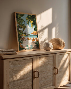 Art print of South Beach, Miami featuring palm trees, lounge chairs, and beach umbrellas on a sunlit display.