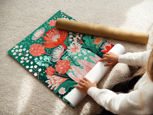 Person unrolling a vibrant Floral Symphony Vase art print featuring bold flowers on a lush green background.