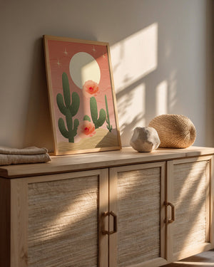 Golden Hour Cactus wall art print featuring cacti and flowers, enhancing bohemian decor with soft sunset colors.