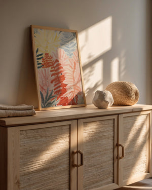 Boho Forest Radiance wall art print featuring vibrant ferns in pastel colors, displayed on a wooden console.