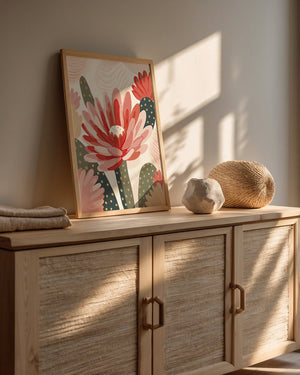 Modern wall art print featuring oversized flowers and cactus in coral and blush tones, perfect for bohemian decor.