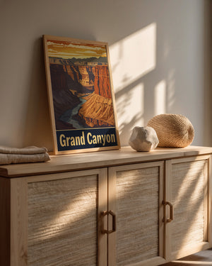 Vintage Grand Canyon travel poster displayed as wall art in a sunny room, showcasing Arizona's stunning landscape.