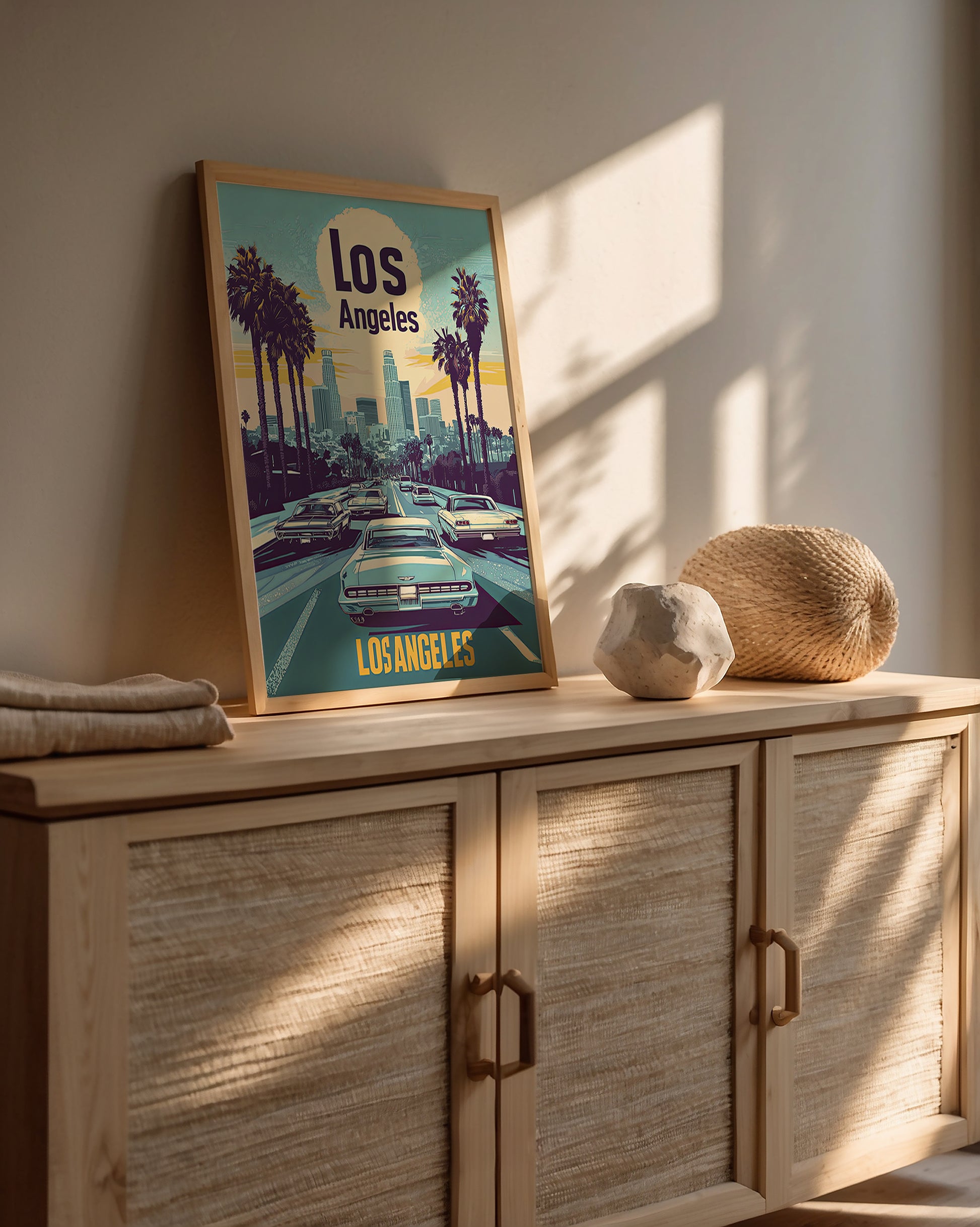 Vibrant vintage travel poster of Los Angeles cityscape with palm trees and classic cars in a bright setting.
