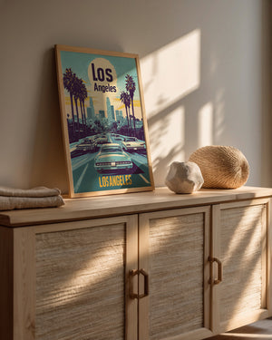 Vibrant vintage travel poster of Los Angeles cityscape with palm trees and classic cars in a bright setting.