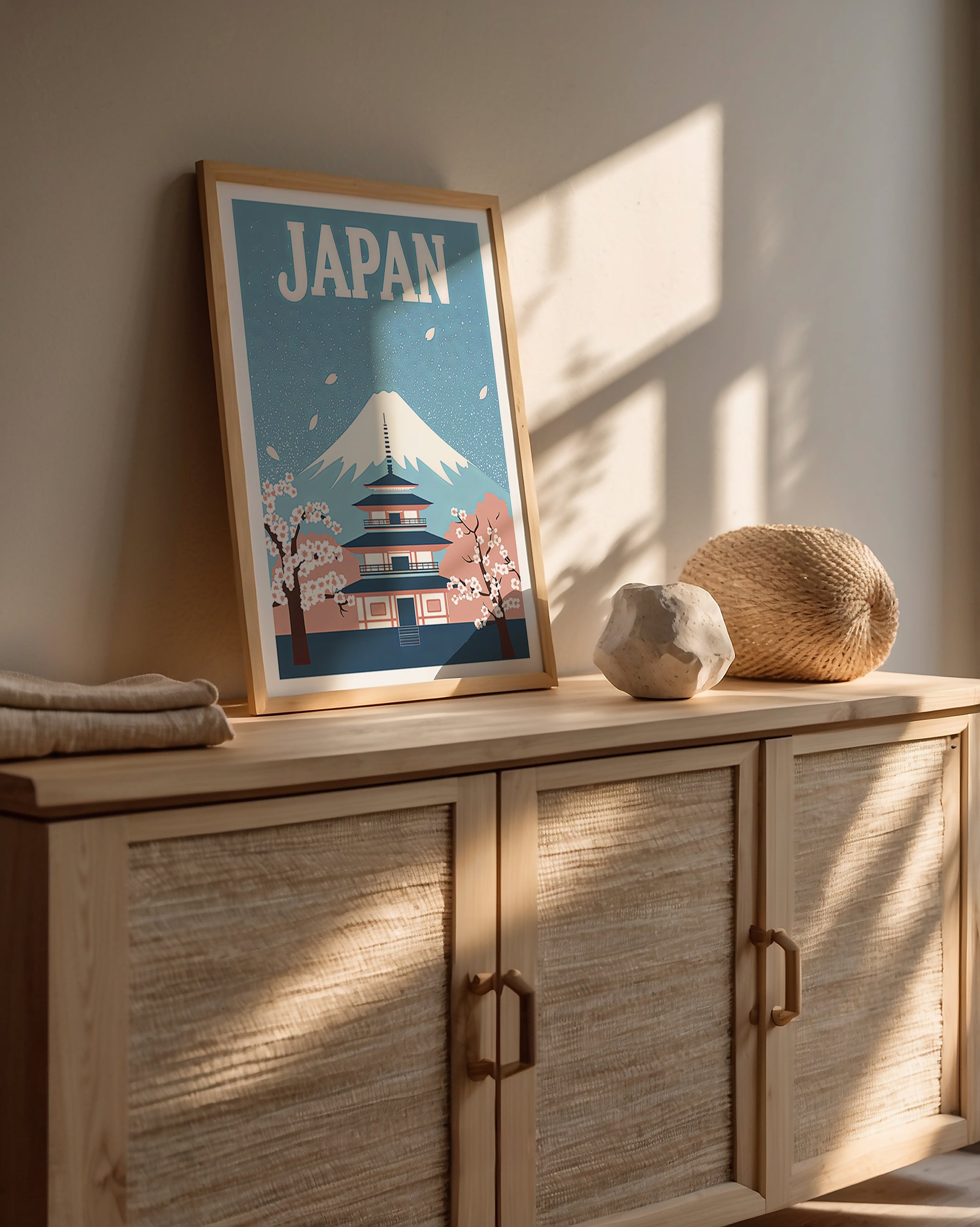 Art print of Mount Fuji and a pagoda framed by cherry blossoms, showcasing Japanese elegance in home decor.