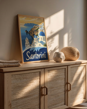 Art print of Santorini featuring blue-domed churches and Aegean Sea view, ideal for wall decor.