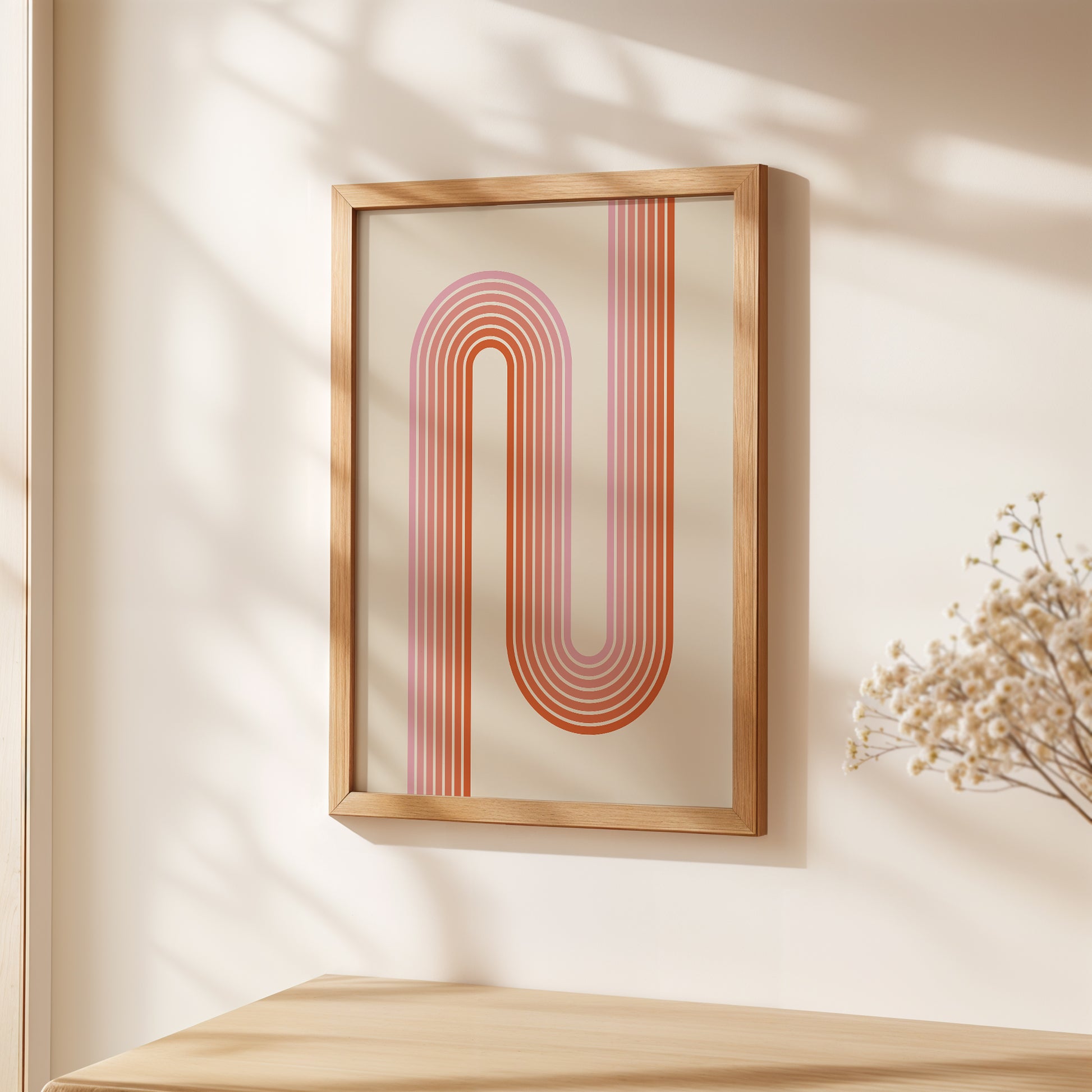 Sunset Stripes wall art print with Bauhaus design, featuring coral and blush geometric patterns in a modern frame.