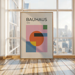 Bauhaus art print featuring geometric shapes and vibrant colors in modern interior setting.
