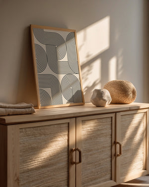 Monoline Motion art print featuring hypnotic black lines on cream background, showcasing Bauhaus design aesthetic.