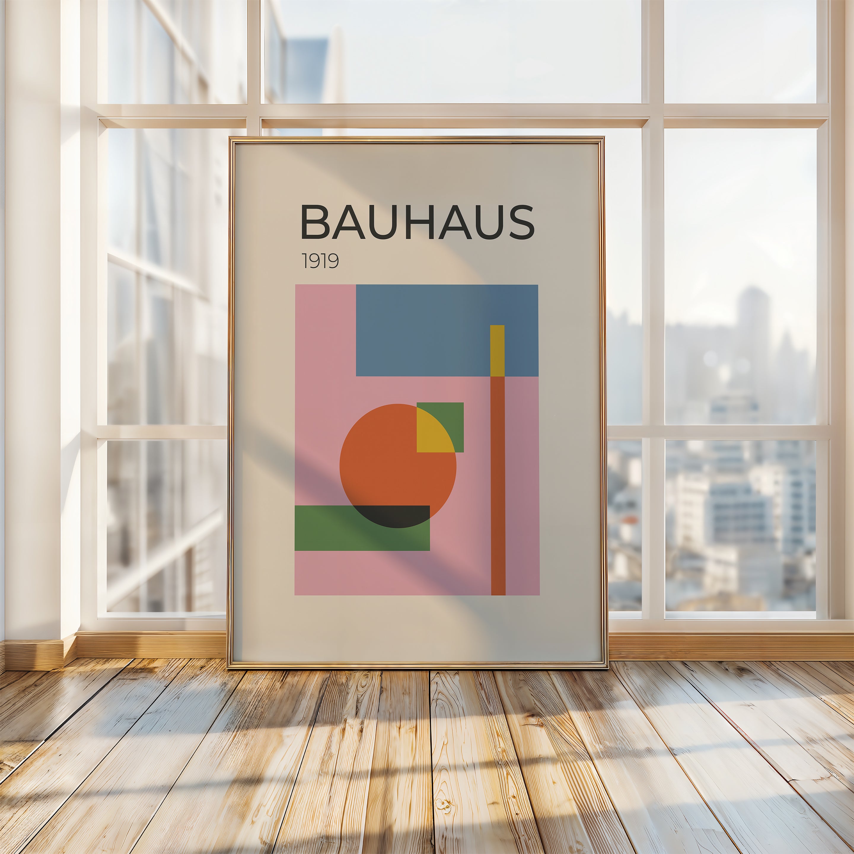 Bauhaus art print in a modern interior, featuring geometric shapes and vibrant colors on a pink backdrop.