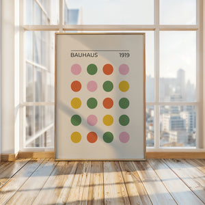 Bauhaus modern art print featuring vibrant colored circles in a minimalist design, displayed in a contemporary interior.