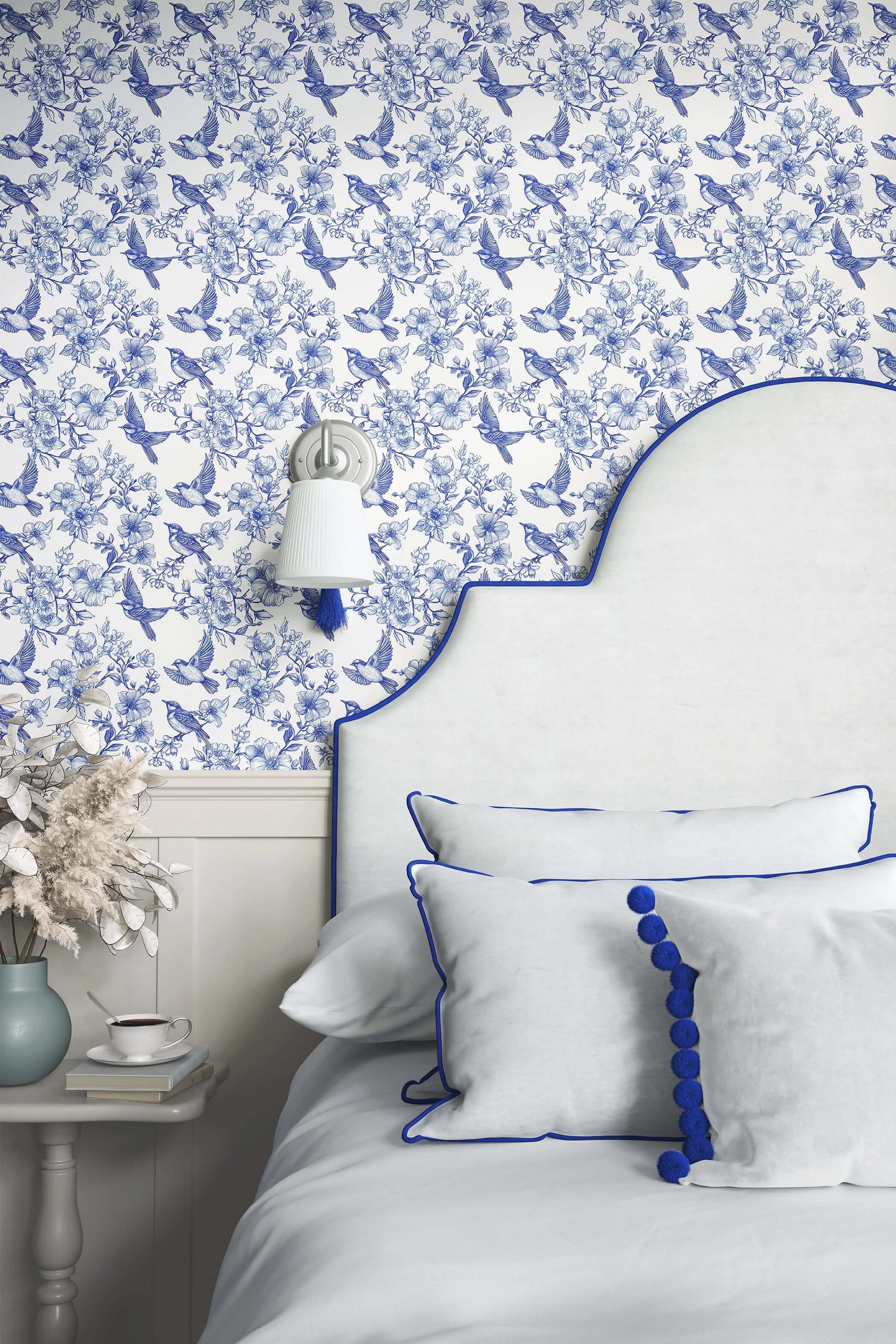 Elegant bedroom with Songbird Garden Toile wallpaper featuring blue-and-white songbirds, perfect for French toile vintage decor.