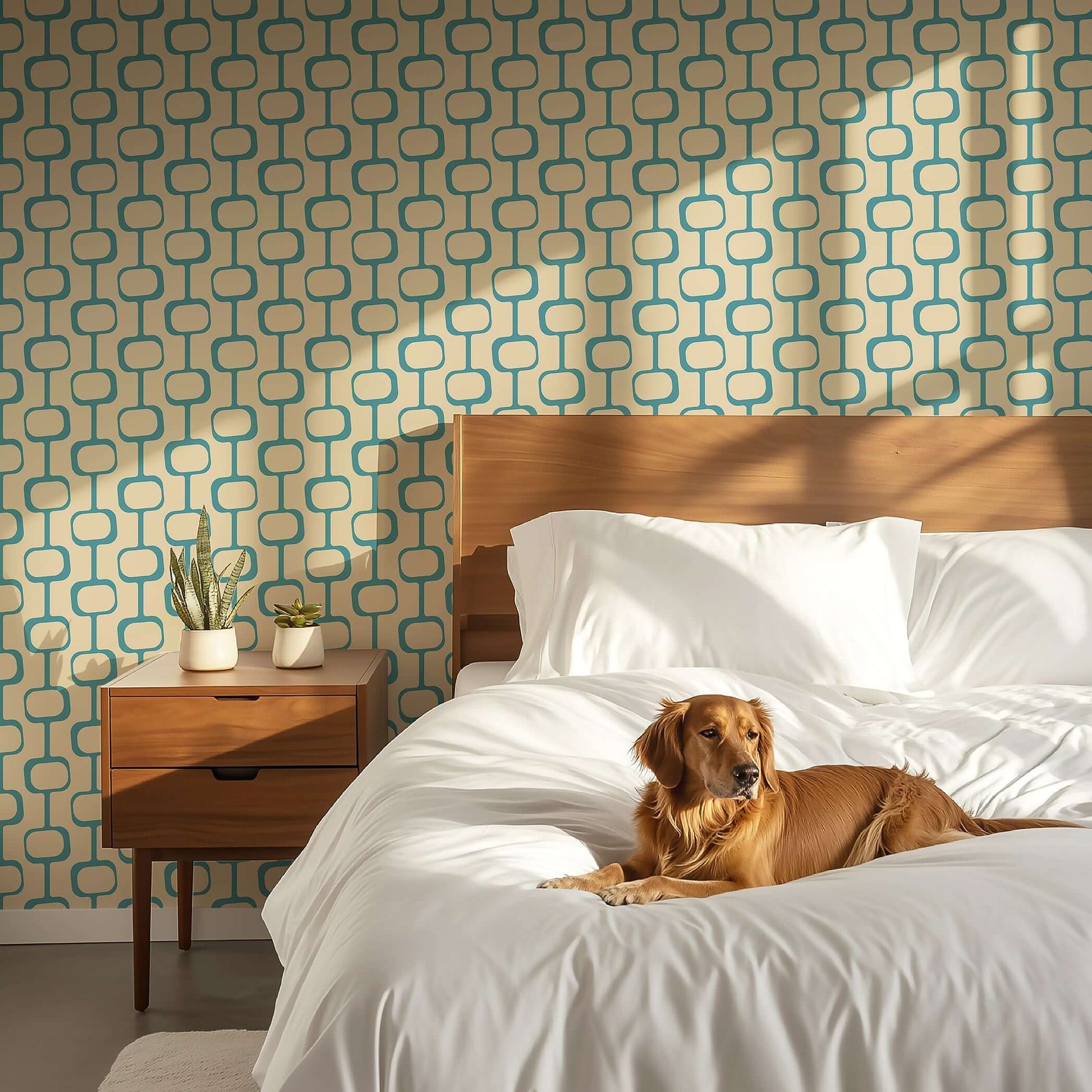 Mid-century modern wallpaper with geometric teal pattern against beige background in bedroom setting with dog on bed.