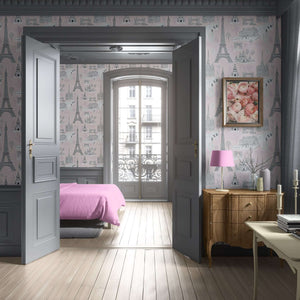 Paris-inspired wallpaper with pink background featuring Eiffel Tower, Arc de Triomphe, and Notre Dame, perfect for children’s nursery or playroom.
