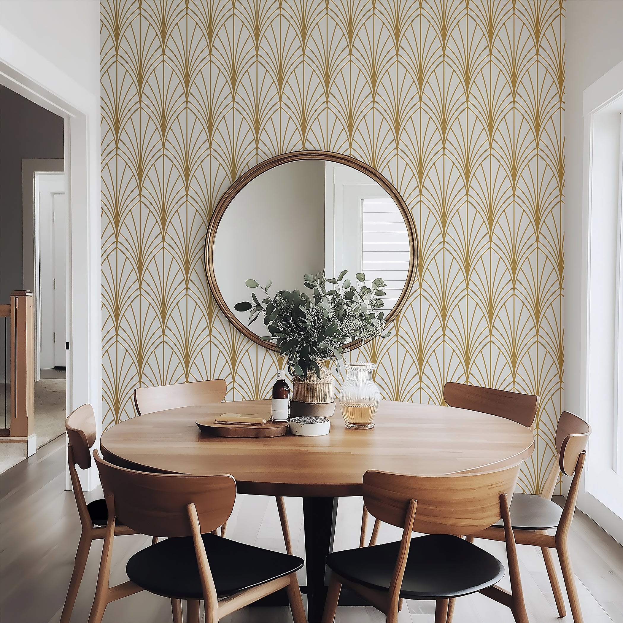 Art Deco wallpaper with gold fan-shaped arches on ivory background, enhancing a dining room with retro geometric elegance.