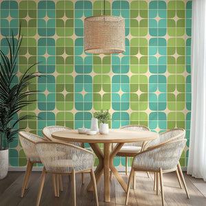 "Atomic Garden Squares" mid-century modern geometric retro wallpaper in greens and blues embellishing a cozy dining room.