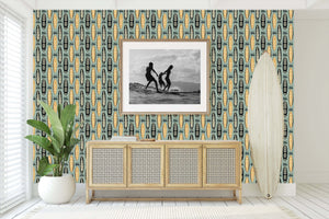 Aloha Boards coastal wallpaper featuring surfboards with tropical designs in a mid-century modern room, ideal for ocean and marine-themed decor.