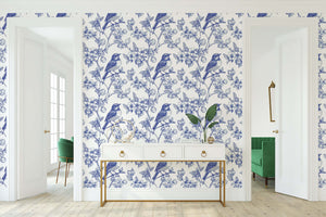 Songbird Garden Toile II wallpaper with blue songbirds and branches, ideal for a vintage, tranquil ambiance in living spaces.