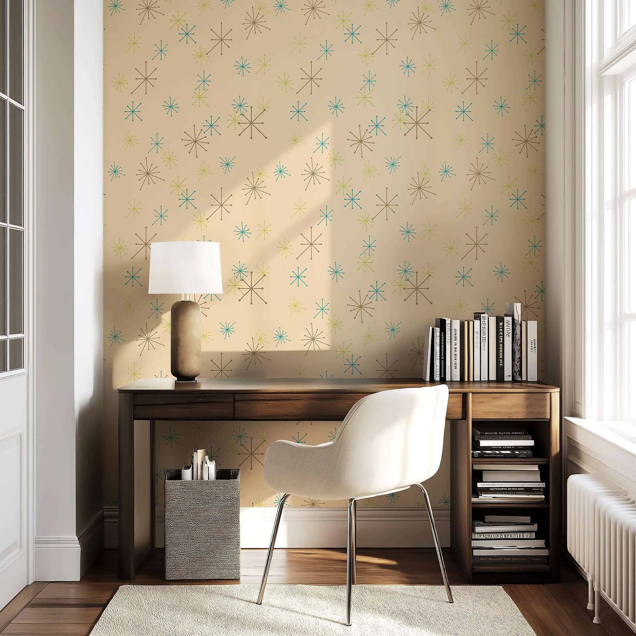 Atomic Burst Fiesta retro wallpaper in a home office, featuring teal, lime, and mocha starbursts on a beige background for mid-century style.