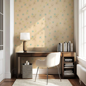 Atomic Burst Fiesta retro wallpaper in a home office, featuring teal, lime, and mocha starbursts on a beige background for mid-century style.