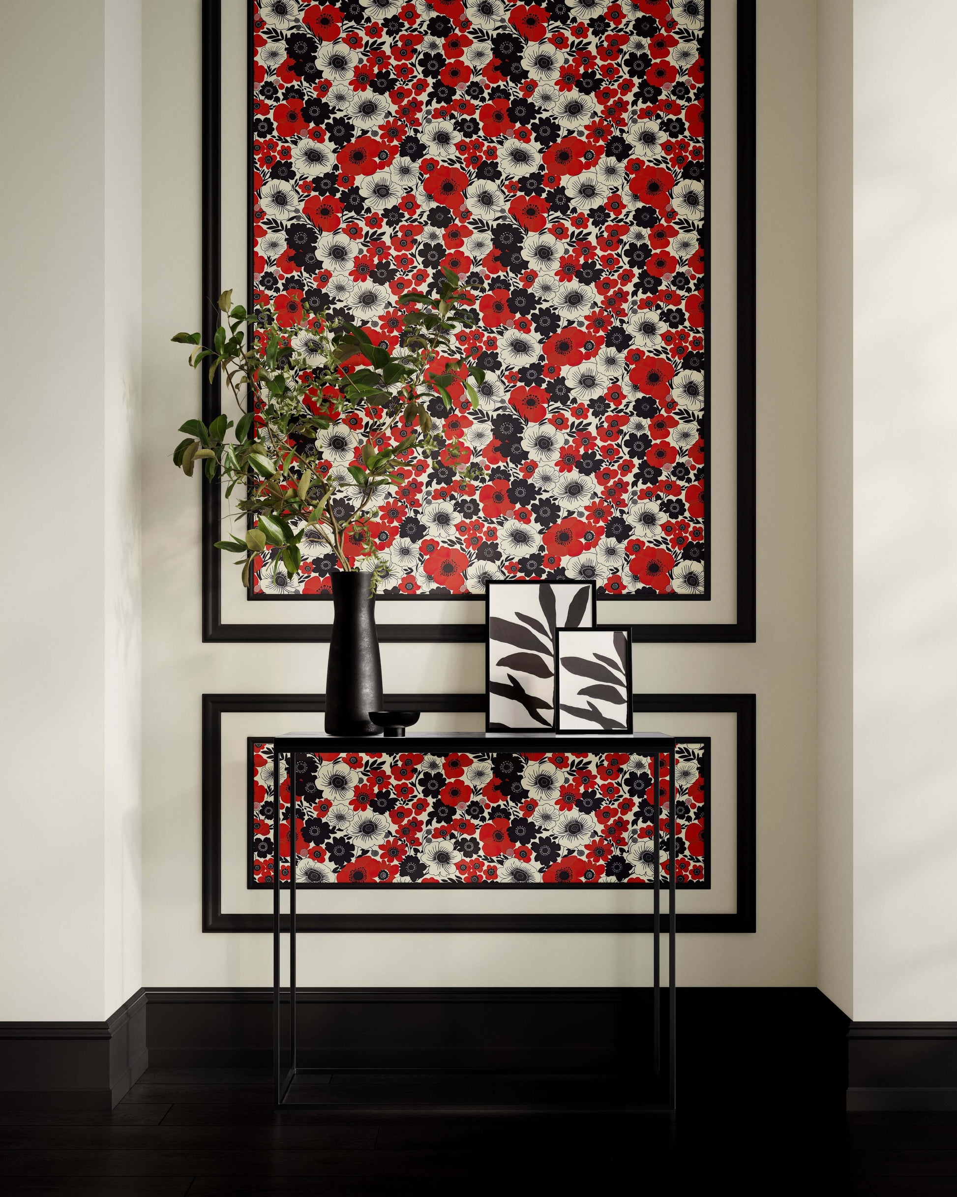 Bold "Wild Poppy Passion" wallpaper with red, black, and white floral design, enhancing a modern and contemporary wall decor setting.