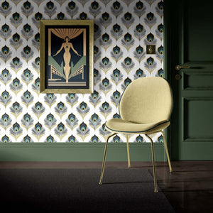 Art Deco room with Sophisticated Plume wallpaper featuring teal, gold peacock feathers and a stylish chair by a classic painting.