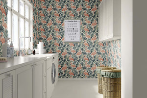 Flamingo Oasis wallpaper featuring flamingos and greenery in a modern laundry room; perfect for a mid-century modern, coastal style.