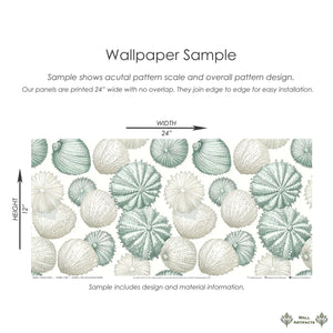 Ocean Jewels wallpaper sample with sea urchin and seashell design in green, cream, and blue tones. Coastal modern beach decor.