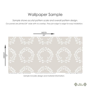 Traditional wreath wallpaper sample with white laurel wreaths on taupe background, showcasing design scale and installation info.