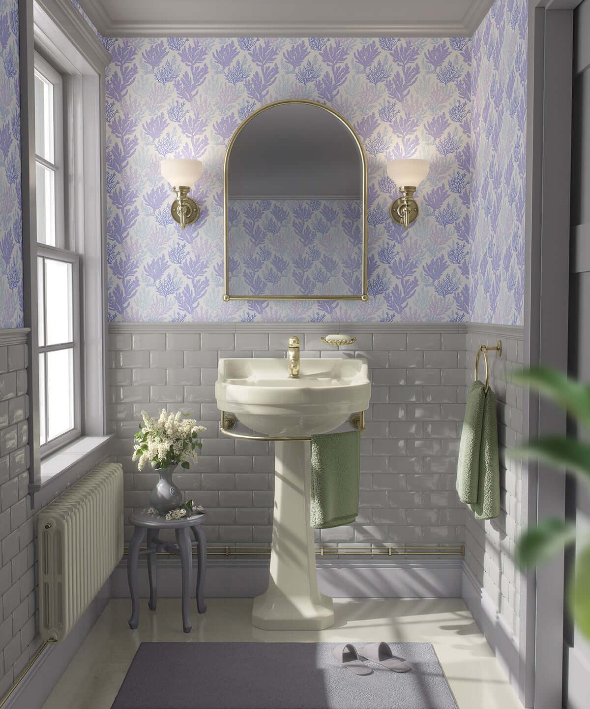 Lavender and blue coral coastal wallpaper in a vintage-style bathroom with white sink and mirrored lighting.
